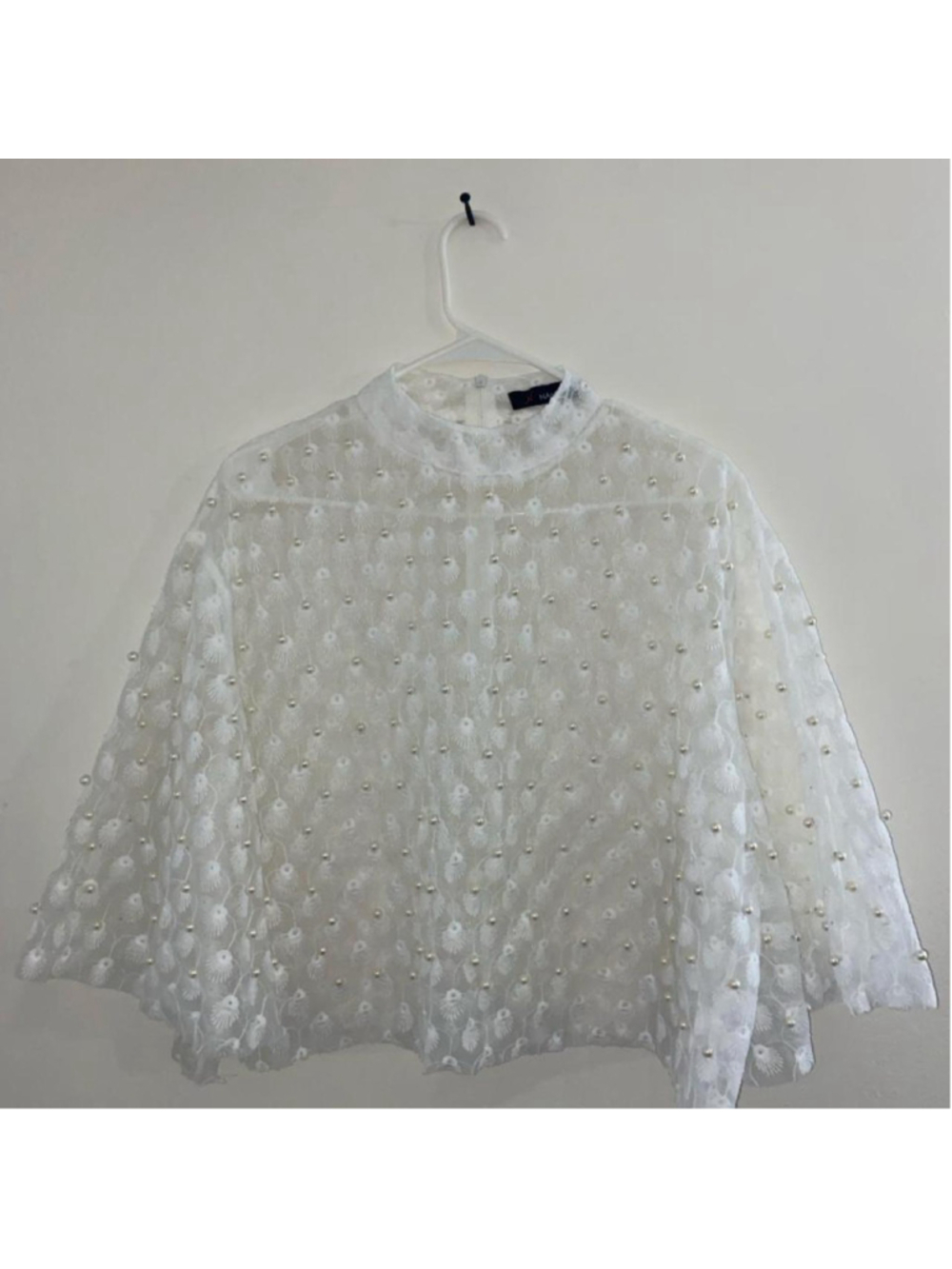 White sheer blouse with pearl beaded embellishments